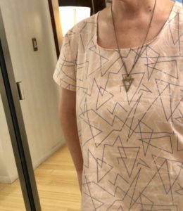 Detail shot of pink tee shirt