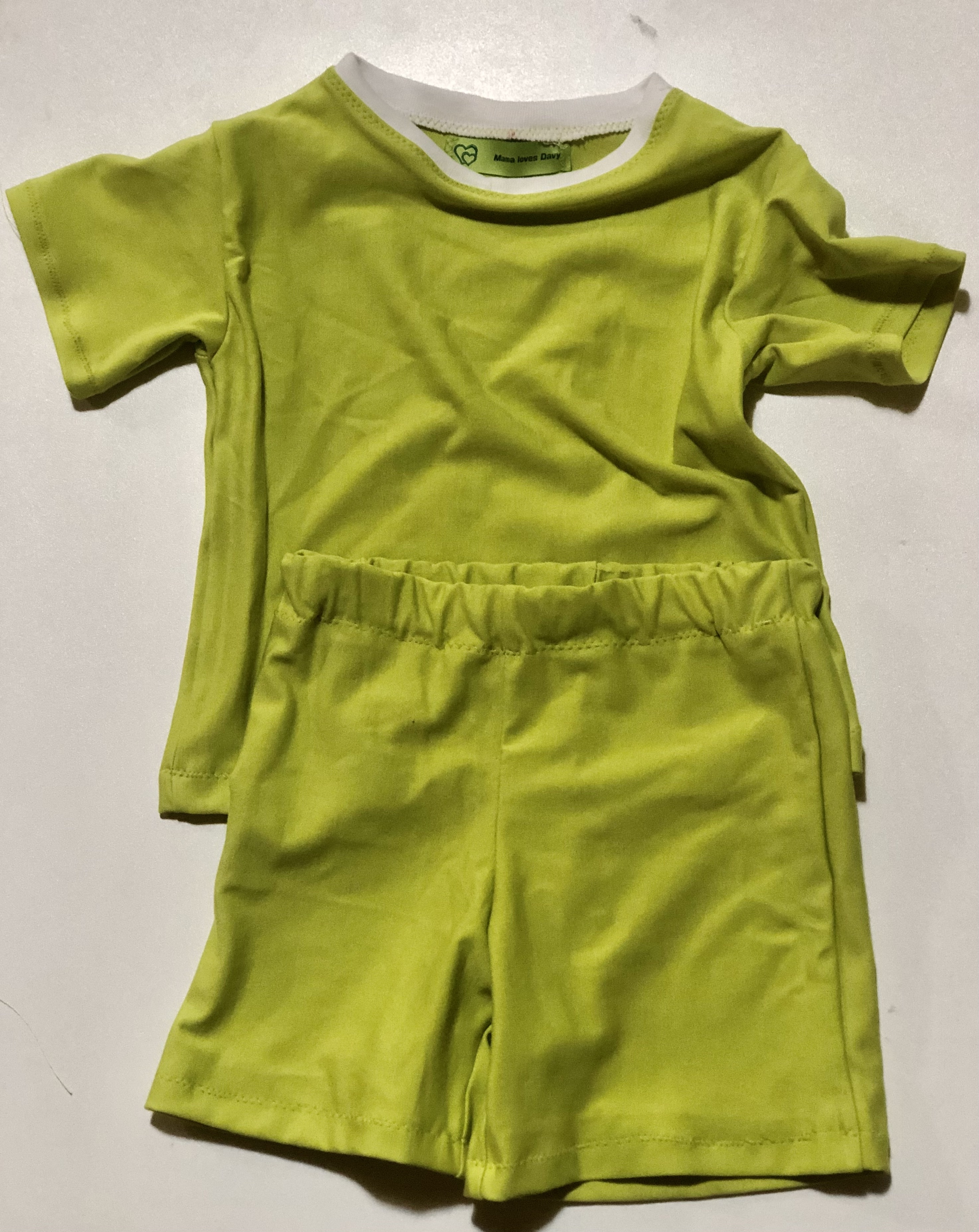 A small T-shirt and matching shorts made from lime-green ponte.