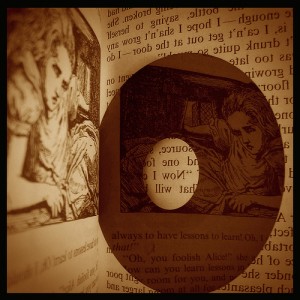 Alice in Wonderland reflected in a CD